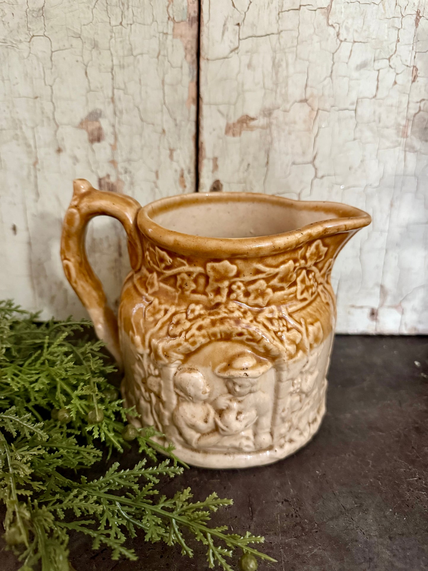 Vintage European Stoneware Pitcher – Embossed Village Scene, Caramel Glaze